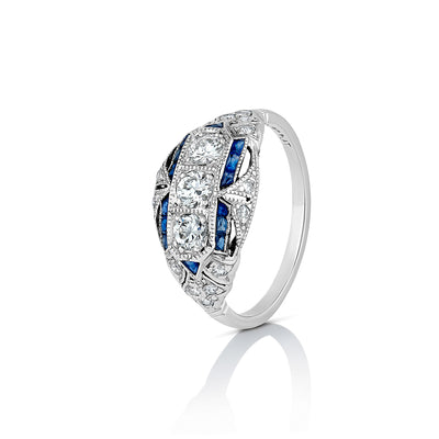 White Gold Ring With 3 Round Brilliant-Cut Diamonds With 12 Sapphires