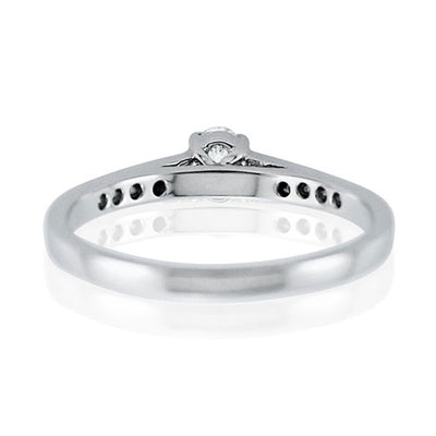 Steffans Oval Cut Diamond Platinum Solitaire Engagement Ring with Grain Set Diamond Shoulders (0.38ct)