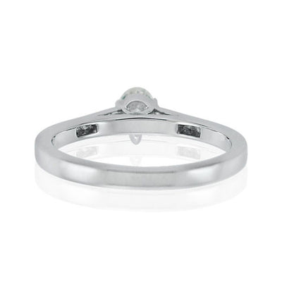 Steffans Pear Shaped Diamond Platinum Solitaire Engagement Ring with Channel Set Princess Cut Diamond Shoulders (0.33ct)