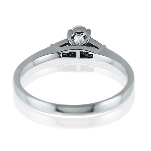 Steffans Oval Shaped Diamond, Platinum Solitaire Engagement Ring with Baguette Cut Diamond Tapered Shoulder (0.38ct) - Steffans Jewellers